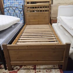 single wooden bed