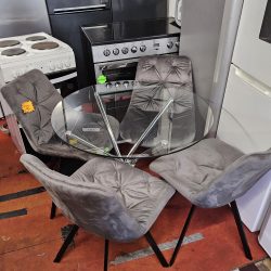 Glass table with four brand new swivel dining chairs